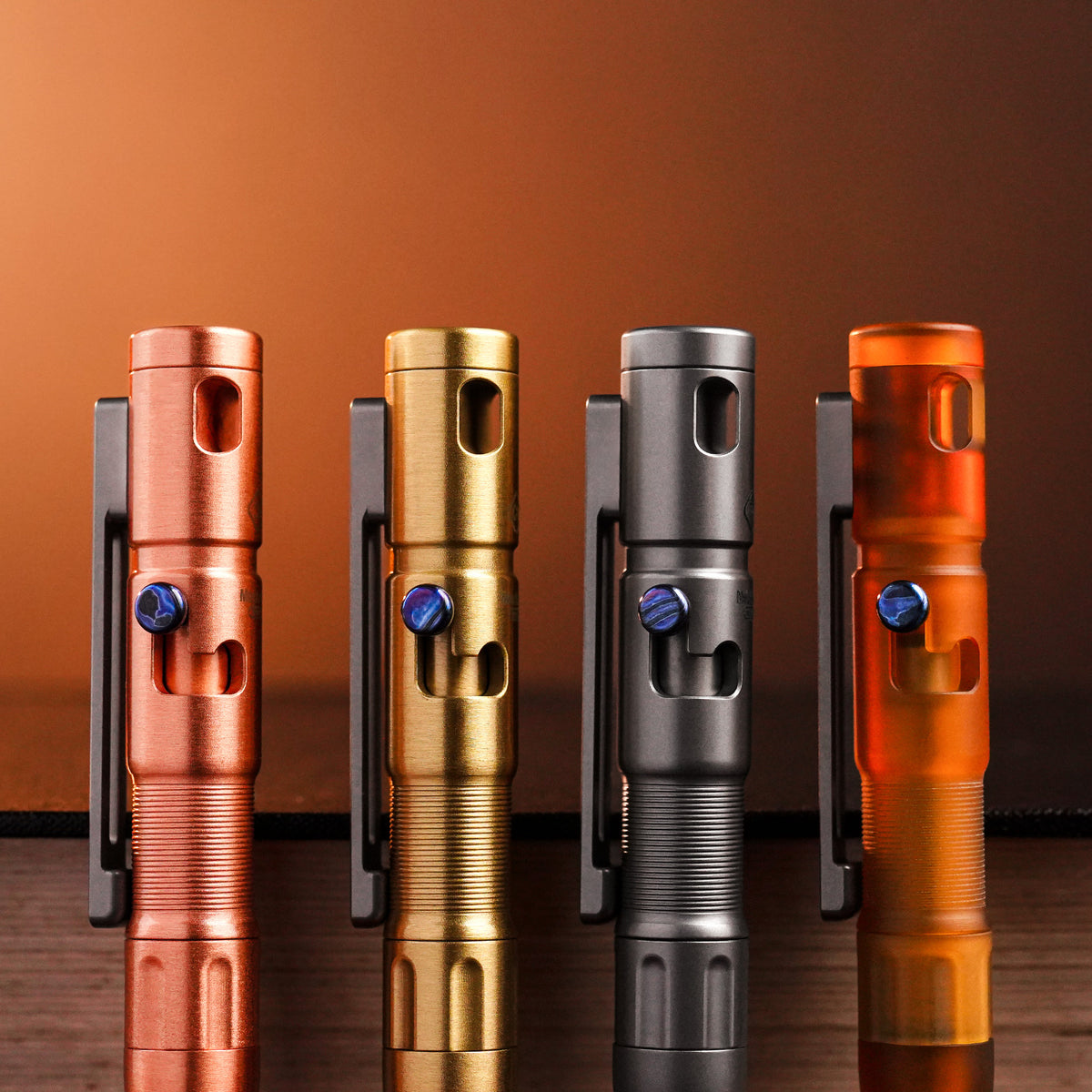 TPX11 pens in copper, brass, titanium, and PEI fitted with zirconium Damascus bolts.