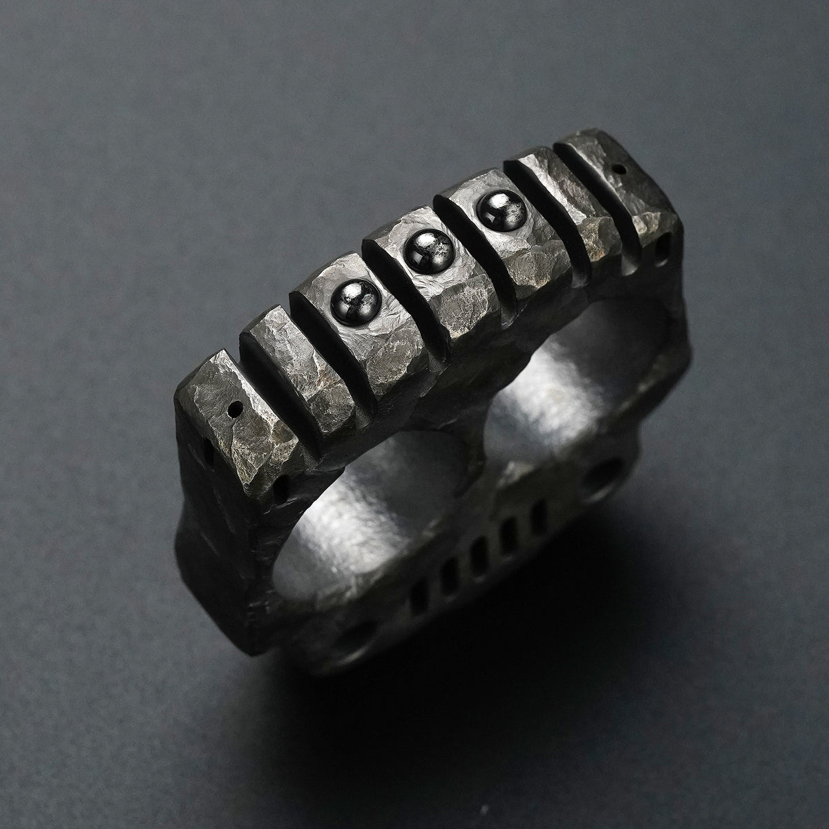 TKF-HC hand-carved titanium EDC knuckle rear detail with sculpted texture and metal accents