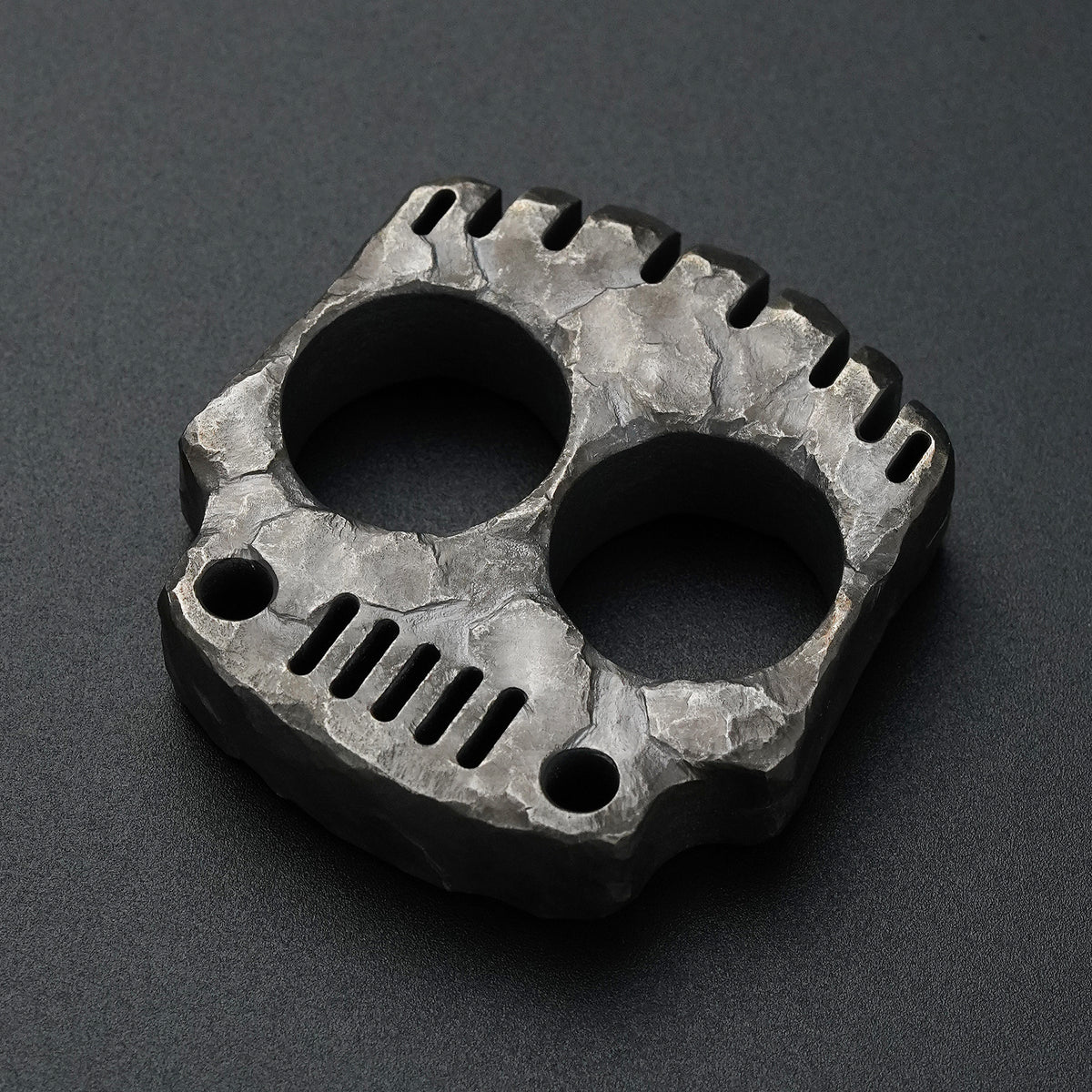 TKF-HC hand-carved titanium EDC knuckle with unique faceted rock texture and sculpted surface